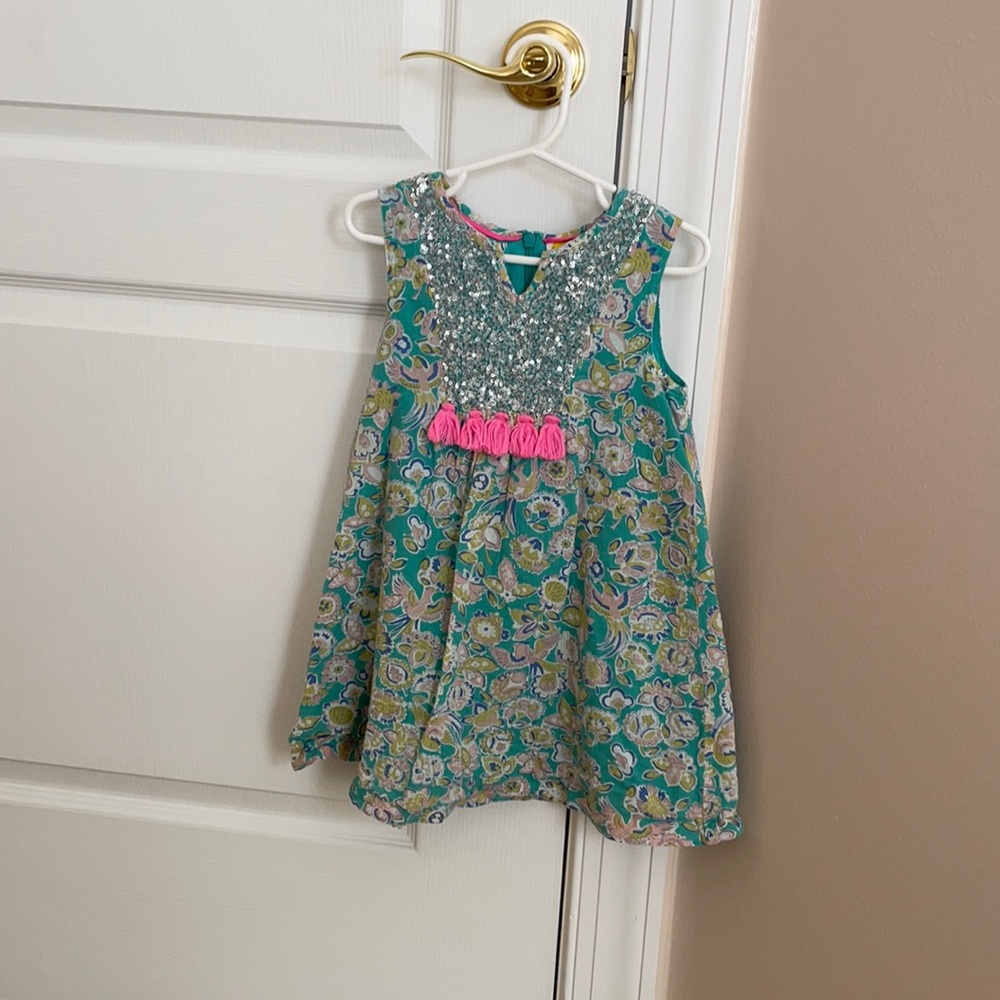 Mini Boden glitter and tassel dress